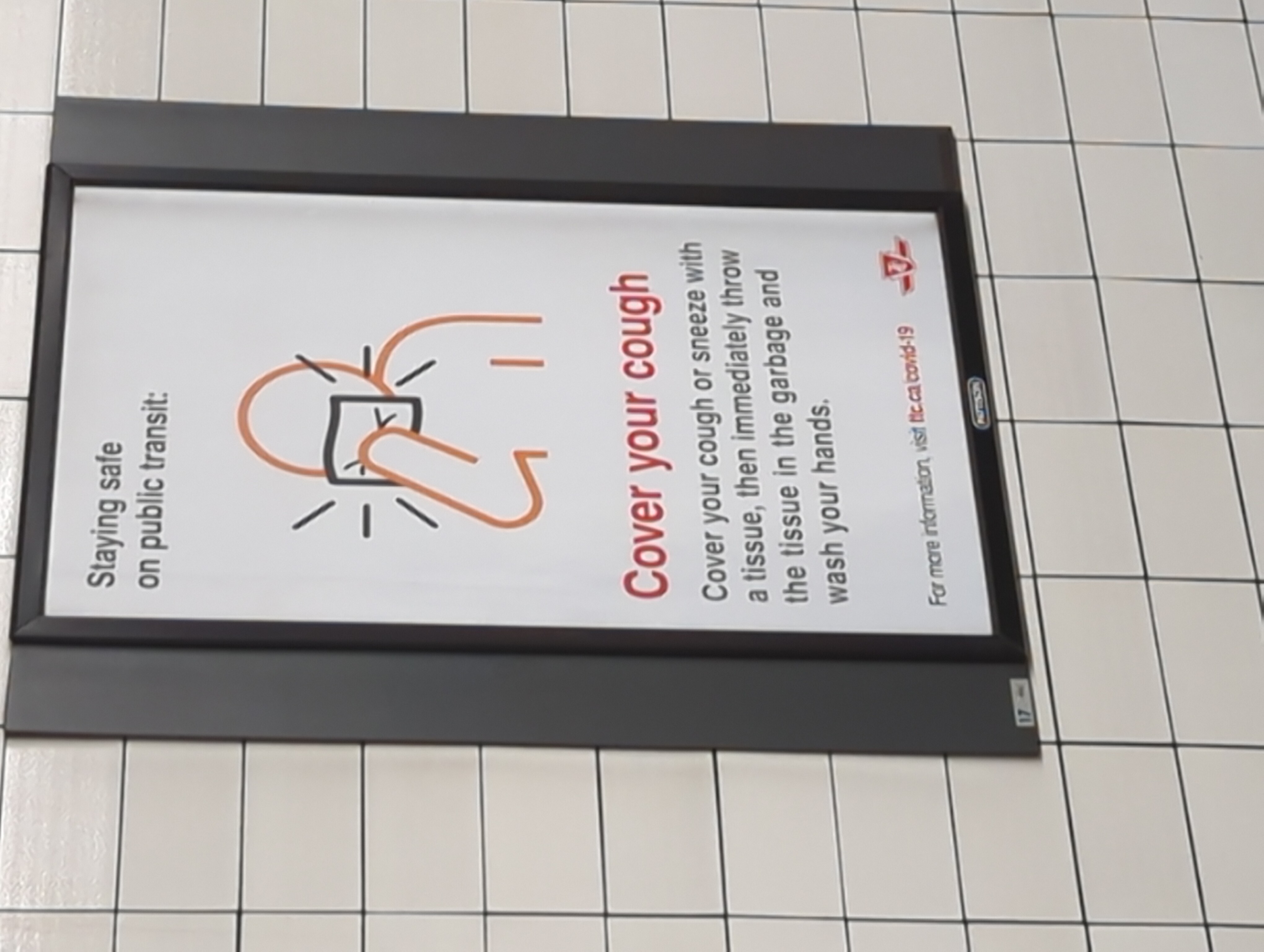 A Toronto transit poster instructing the reader to cover their cough.